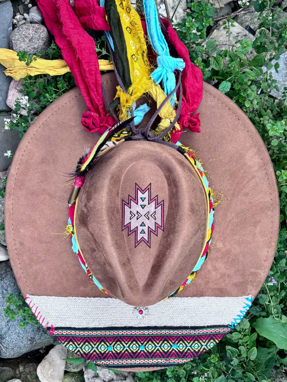 Close-up of hand-painted southwest aztec design on rancher hat brim