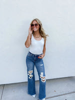 BLAKELEY MEDIUM WASH DISTRESSED JEANS - The Elevated Hippie