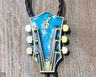 Corded  Brass Guitar Headstock Bola – Boho Charm for the Free Spirit - The Elevated Hippie