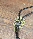 Corded  Brass Guitar Headstock Bola – Boho Charm for the Free Spirit - The Elevated Hippie