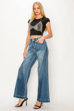 Artemis Vintage High Rise Flare Jeans – Color Block Detail, Relaxed Fit, Stretch Denim - The Elevated Hippie
