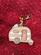 Hand-tooled leather vintage camper bag charm with heart door