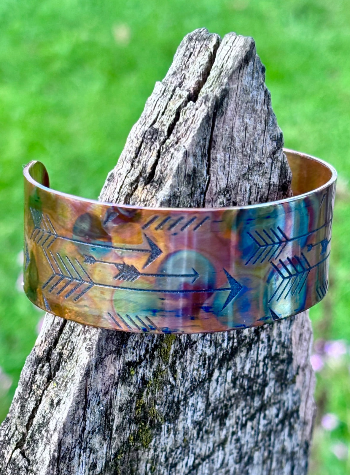 Mens fire painted copper cuff bracelet worn on wrist