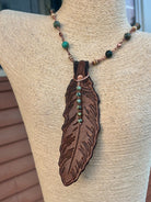Necklace worn without leather feather pendant, beaded strand only