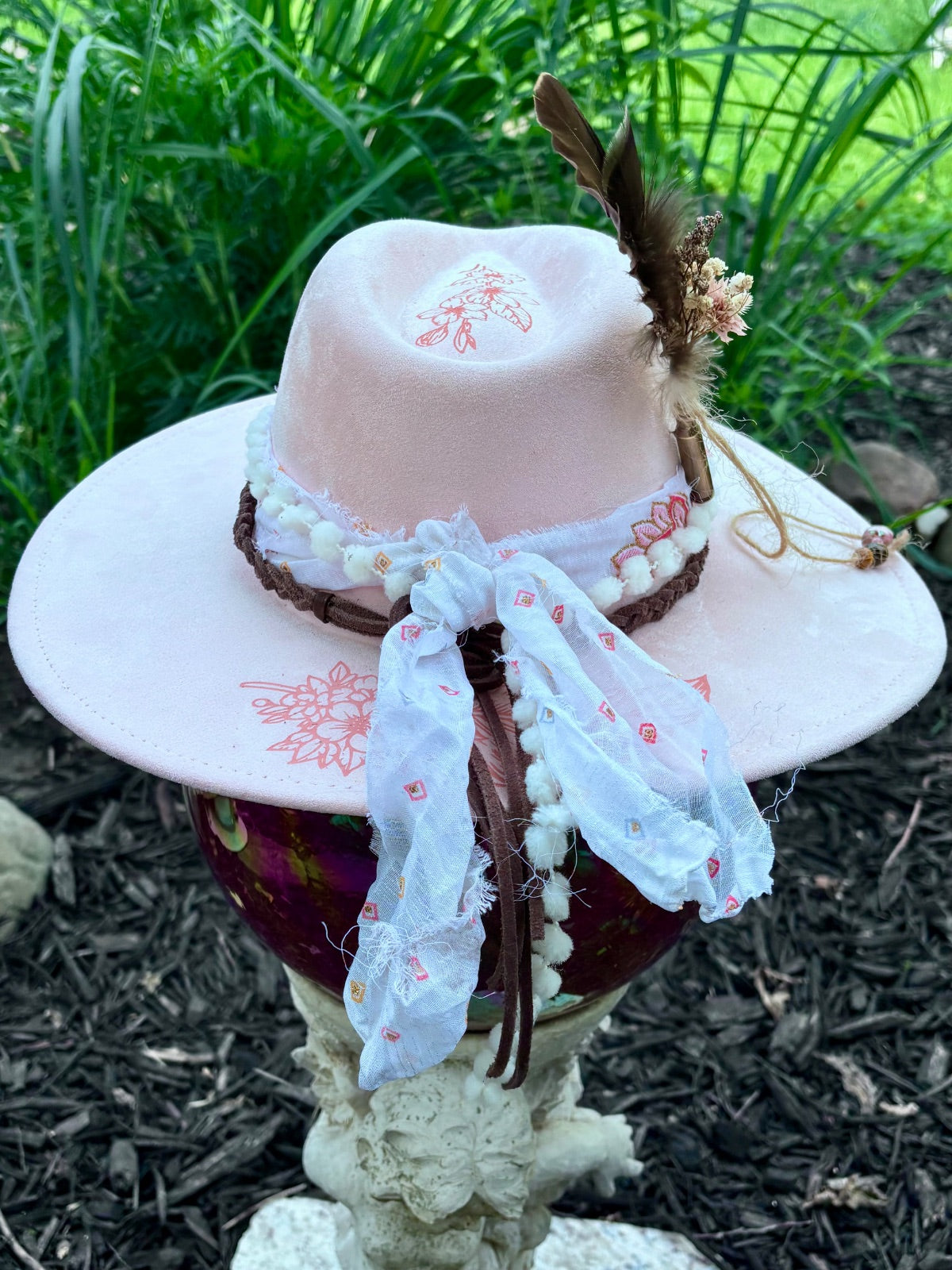 Pink butterfly and feather vegan suede rancher hat worn, styled shot