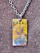 Fire painted copper necklace worn, styled shot