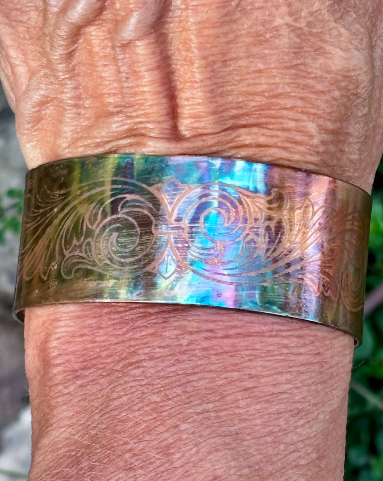 Color variation detail on fire painted copper cuff