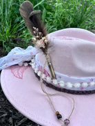 Back view of pink butterfly and feather vegan suede rancher hat