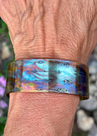 Mens fire painted copper cuff bracelet, top-down view