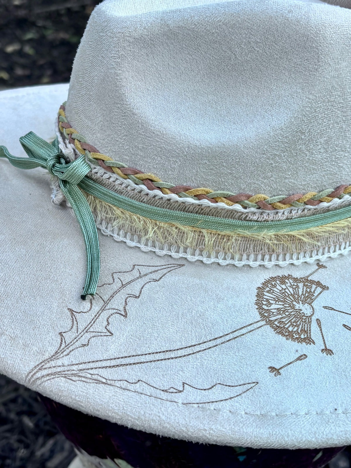 Layered hatband detail on dandelion rancher hat