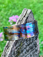 Mens fire painted copper cuff bracelet styled flat lay