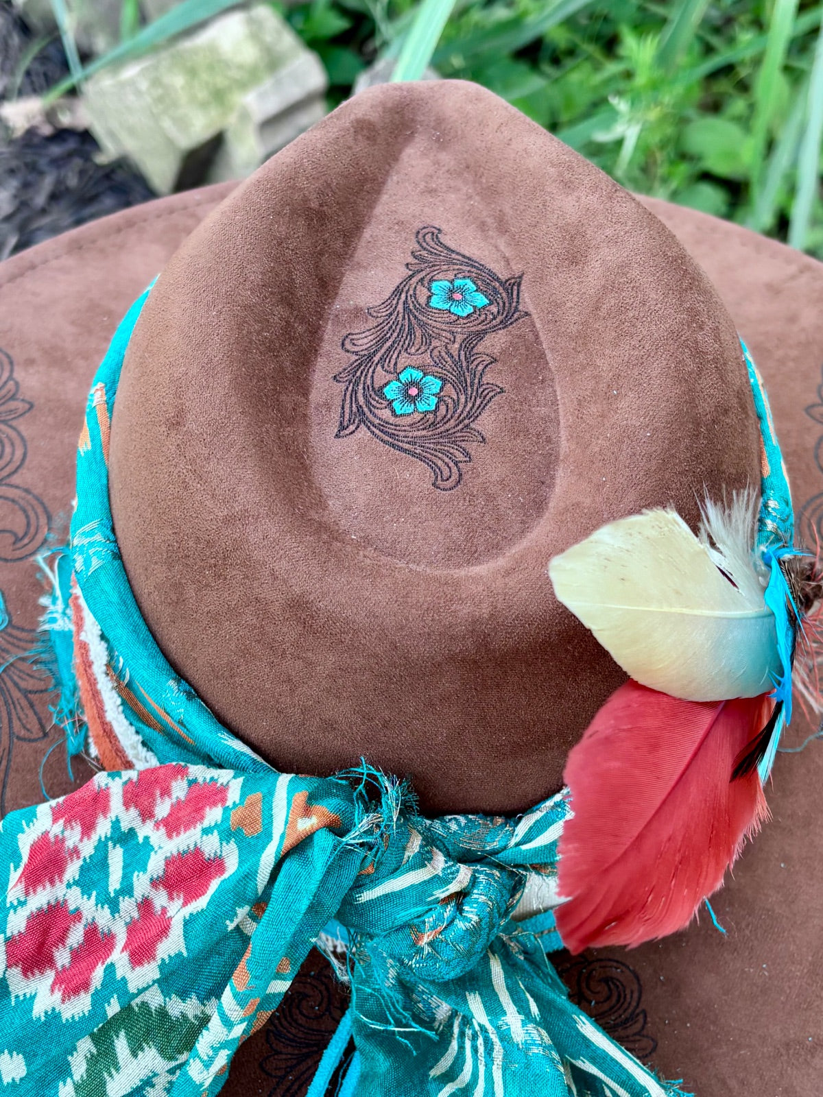 Turquoise flower vegan suede rancher hat, top-down view