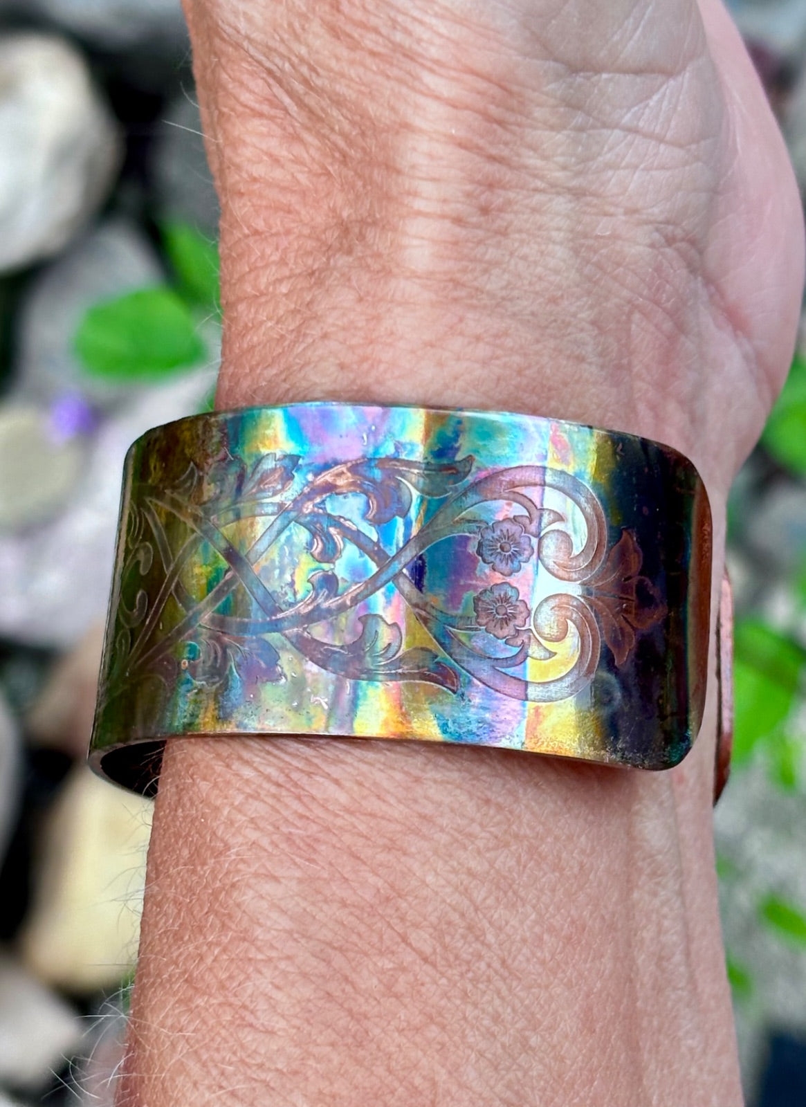 Fire painted copper cuff bracelet styled flat lay