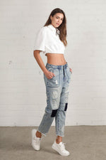 Raw Hem Patched Jeans – Slouchy, Soulful, and Worn-In Just Right - The Elevated Hippie